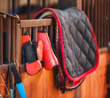 red and black cordless power drill beside black and red cordless power drill